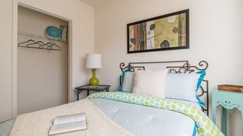 Desert Sands bedroom with sliding closet doors. 